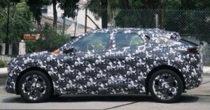 Perodua &lsquo;QV-E&rsquo; EV spied again in Malaysia &ndash; sloping roofline, small side window revealed; debut in Q4 2025